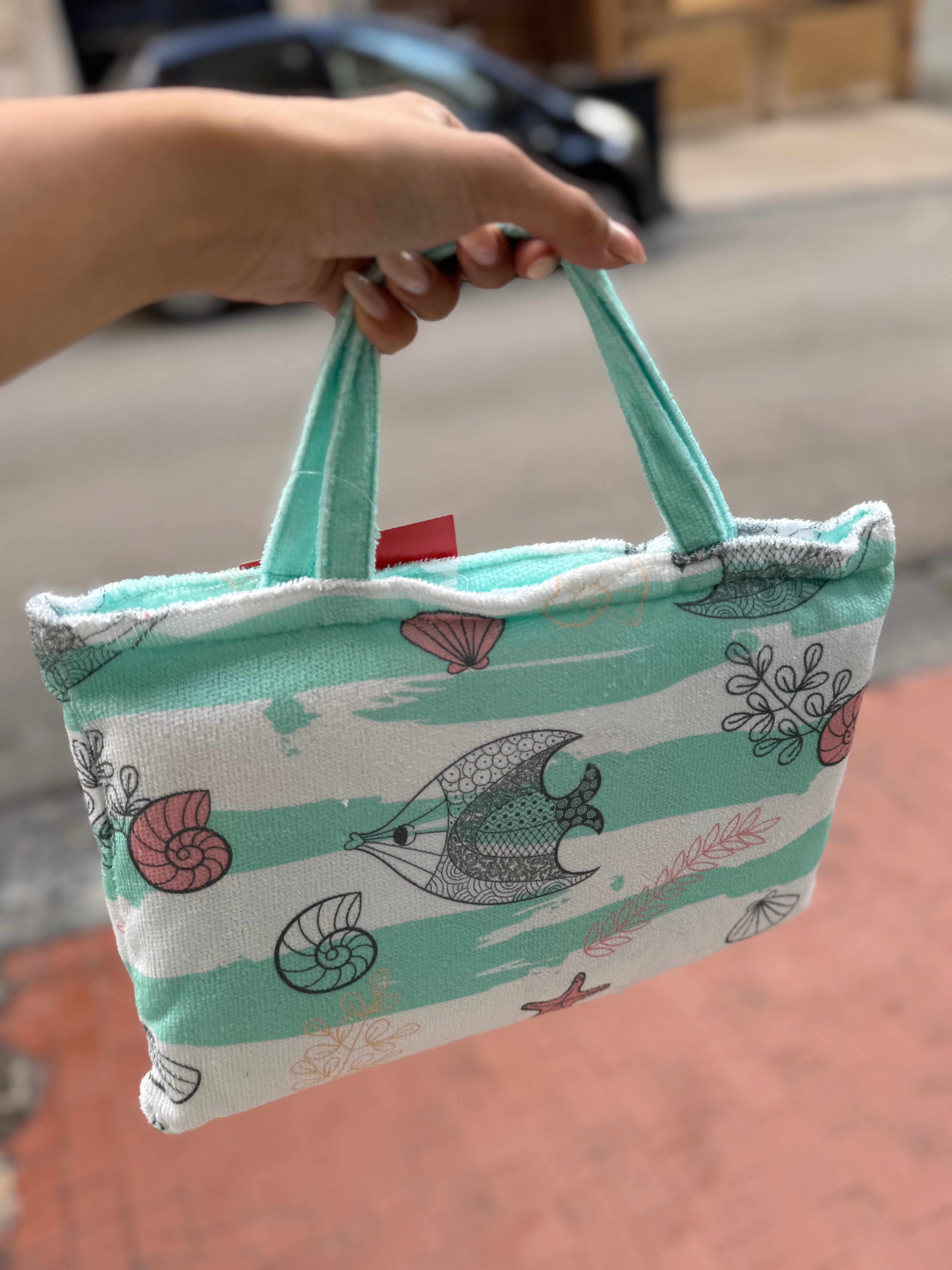 Telo mare compreso borsa